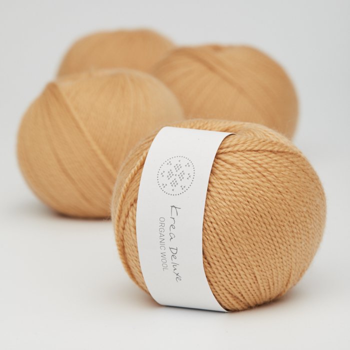 kologisk merino uldgarn 50g - Mrkegul 06